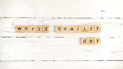 World Quality Day.words from wooden cubes with letters photo