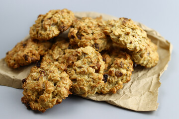 Homemade oatmeal cookies with raisins on craft paper
