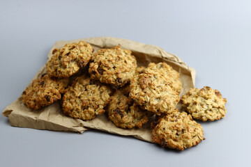 Homemade oatmeal cookies with raisins on craft paper