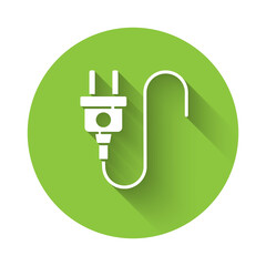 White Electric plug icon isolated with long shadow. Concept of connection and disconnection of the electricity. Green circle button. Vector.