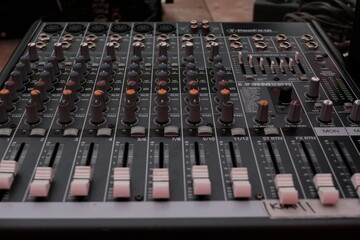 The mixing console lies on the table