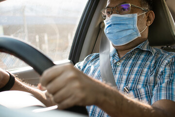 Closeup a male wearing a face mask prevents the coronavirus or the COVID-19 outbreak in daylight by...