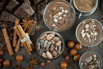 Fototapeta na wymiar Cocoa beans on an old background.