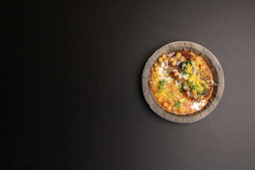 Ragda pattice -Aloo tikki or Potato Cutlet or Patties is a popular Indian street food made with boiled potatoes, spices and herbs served with tamrind chutney and peas curry.