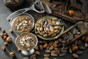 Cocoa beans on old background