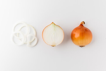 Fresh onion sliced half and ring. Healthy vegetables and food. Raw onion put on white table background.