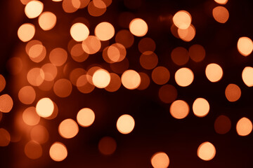 Abstract gold bokeh texture on black background