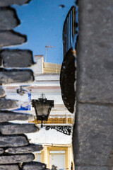 Street lamp and house reflection