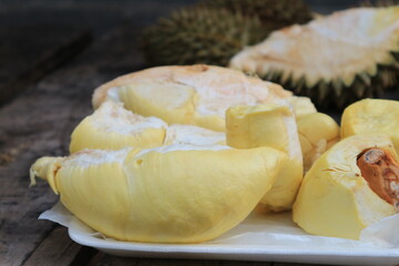 Fresh Durian Fruit on wood background