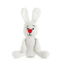Obraz premium Cute knitted toy bunny isolated on white