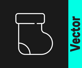 White line Baby socks clothes icon isolated on black background. Vector.