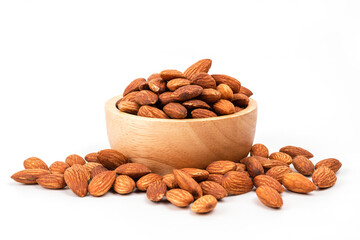 Almond in a wooden cup isolated on white background , It a healthy snack high energy
