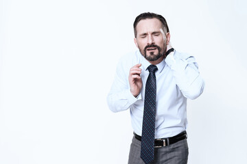 Fototapeta premium Man on a white and suffers from neck pain.