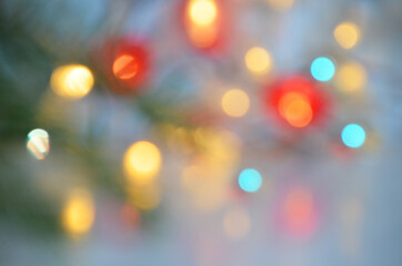 Red yellow blue and orange holiday bokeh. Abstract Christmas background new year background, no focus, blur, blurry