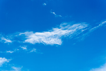 Naklejka na ściany i meble african stock photo of white clouds in a crisp blue sky