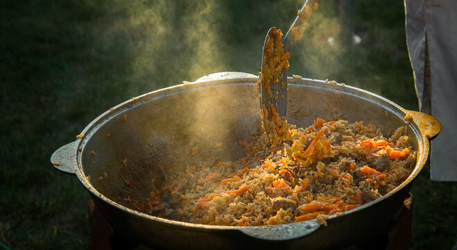 hot fragrant delicious pilaf cooked in nature