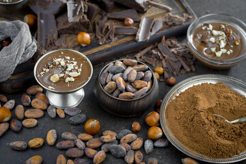 Cocoa beans on an old background.