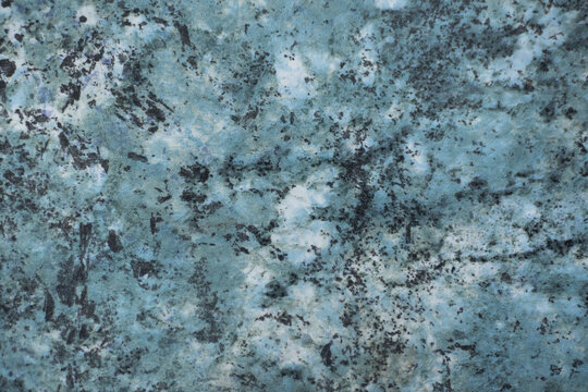 Beautiful abstract grunge decorative dark navy blue stone wall texture. Rough indigo blue marble background..