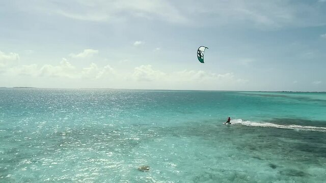 Kitesurfing In Tropical Turquoise Lagoon, Aerial view in a paradisiac beach sardina island .  Los Roques, Venezuela.
