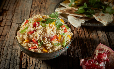 Bowl of mixed quinoa and couscous salad