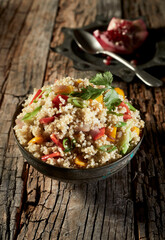 Large bowl of healthy couscous and quinoa salad