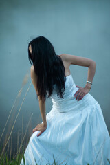 Fototapeta na wymiar beautiful girl in a white dress