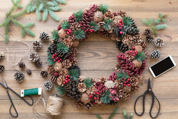 Handmade Holiday Wreath and Smart Phone Flat Lay