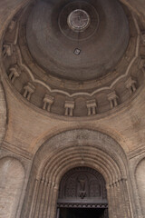 Obraz premium The entrance to the cathedral. Architectural detail. Brick cathedral. Structural brick columns bearing the dome. Arch entrance in the cathedral.