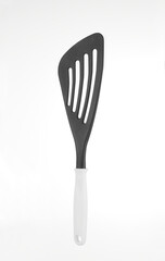 Plastic black kitchenware utensil isolated on white background.