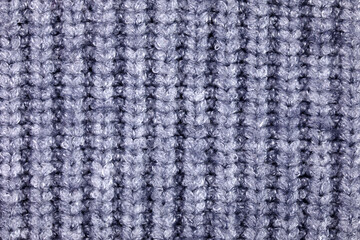 grey knitted texture and background.