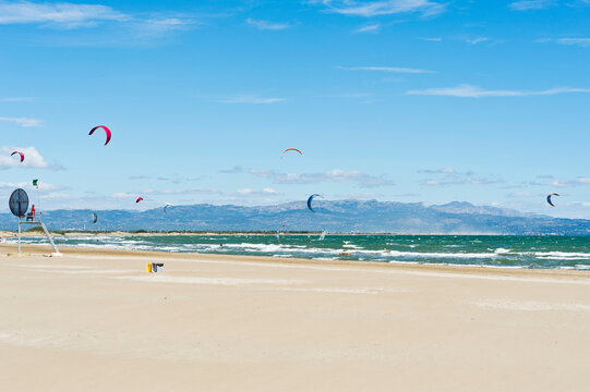 Kite surfing and windsurfing off Riumar beach, near Deltebre,  Parc Natural del Delta de l'Ebre, Castell&oacute;n,  Eastern Spain