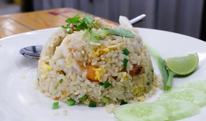 Thai fried rice with prawns, lemon, spring onions, coriander.