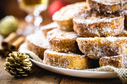sweet christmas, typical christmas dessert from brazil. Called french toast, baked or fried bread with sugar and cinnamon.