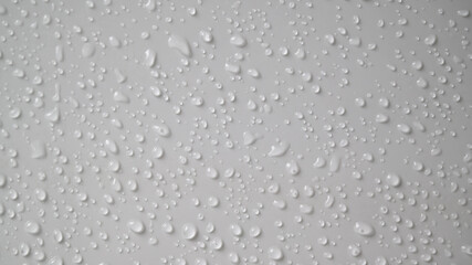 Water drops on ceramic  surface background