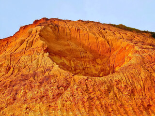 Beautiful Algarve beach with red cliffs, Olhos de Agua, Albufeira