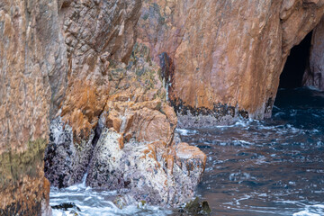 Detail of the rocky coastline of the Freycinet Peninsula, Tasmania