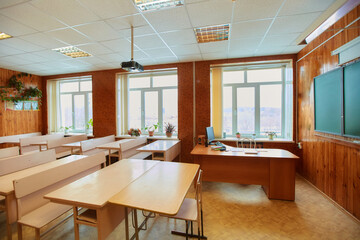 Interior of an empty school classroom. Concept of coronavirus COVID-19 quarantine in schools and educational institutions