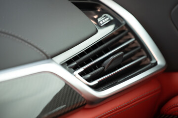 Close up car ventilation system and air conditioning - details and controls of modern car...