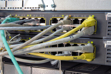 Network cable in the data center. Fiber-optic information technology data transfer is in progress....