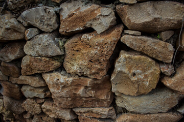 Wall made of stones. Rocks texture. 