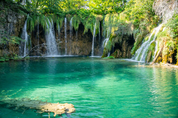 Amazing azure lake with waterfalls - obrazy, fototapety, plakaty