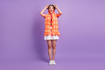 Full length photo of lady open mouth wear jacket sunglass striped t-shirt short skirt footwear isolated purple color background