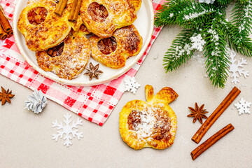 Naklejka na ściany i meble Christmas or New Year sweet apple puffs, fresh homemade bakery