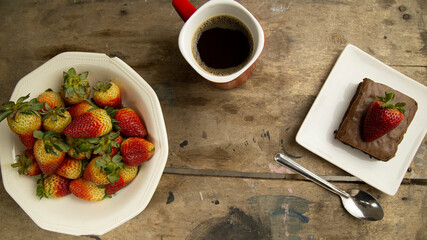 set of strawberries on blue textured background