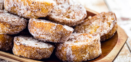 baked or fried bread with sugar and cinnamon. Dessert called Rabanada, Torrija or golden bread. cooking do Brasil, Portugal and Spain