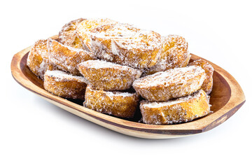 Dessert of bread known as golden slice, slice of lamb, french toast, Eggy bread, French toast, “Pain Perdu”. Isolated white background