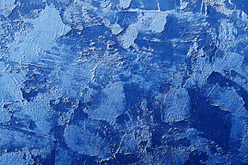 Blue background. Texture wall navy color. Abstract dark blue paint pattern. Texture stone concrete wall. Rough grain backdrop plaster. Surface stucco. Design banner, wallpaper, poster, template, card