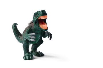 Dinosaur plastic toy. Children's toy, animal figure isolated on white background with copy space.
