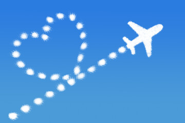 Fototapeta premium Heart shape cloud with plane on blue sky