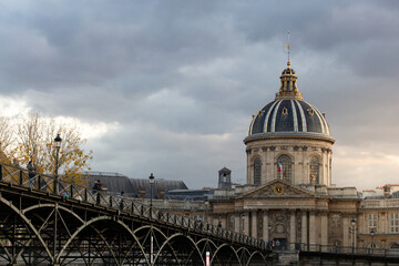 Historic building in Paris with stormy skies